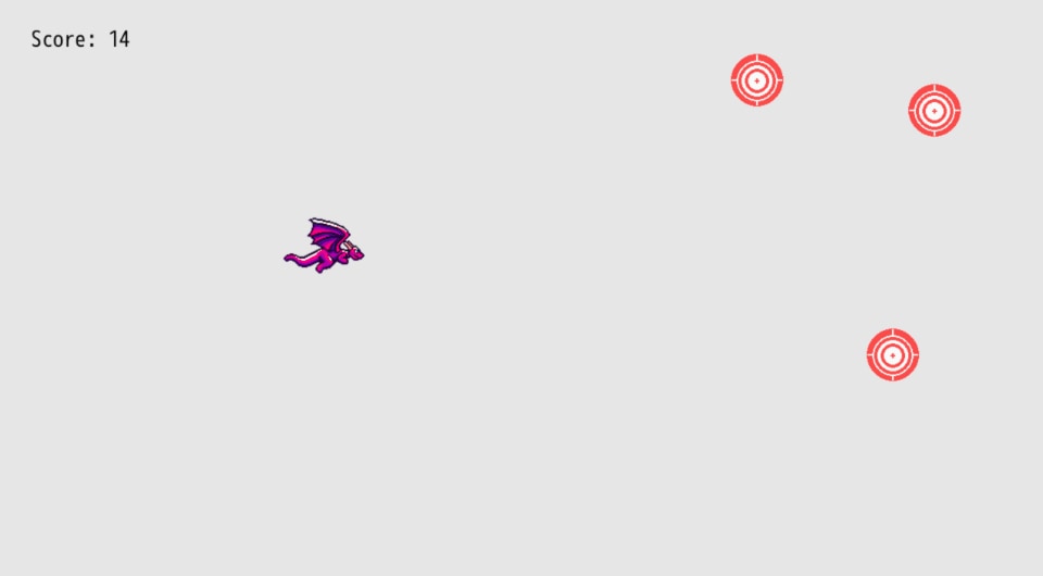 dragon spitting fireballs at three targets on the right side of the screen with the text 'Score: 14' displayed